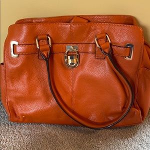 Calvin Klein orange leather purse